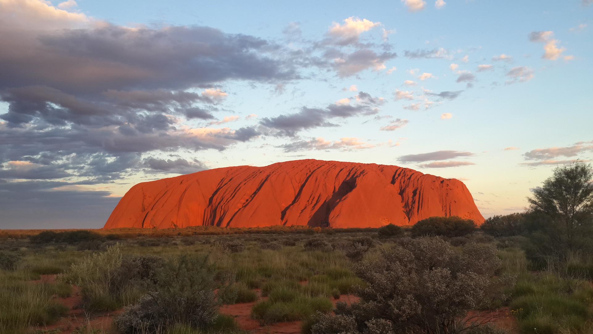 The height of the Uluru is almost comparable to Empire State Building while the width equals to 30 longer edges of a soccer field. We had to drive 5 more kilometers from the place where took this picture to get to the rock.
